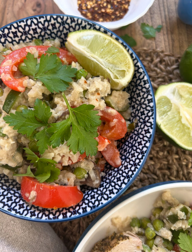 Cauliflower rice with vegetables, coconut milk, and lime