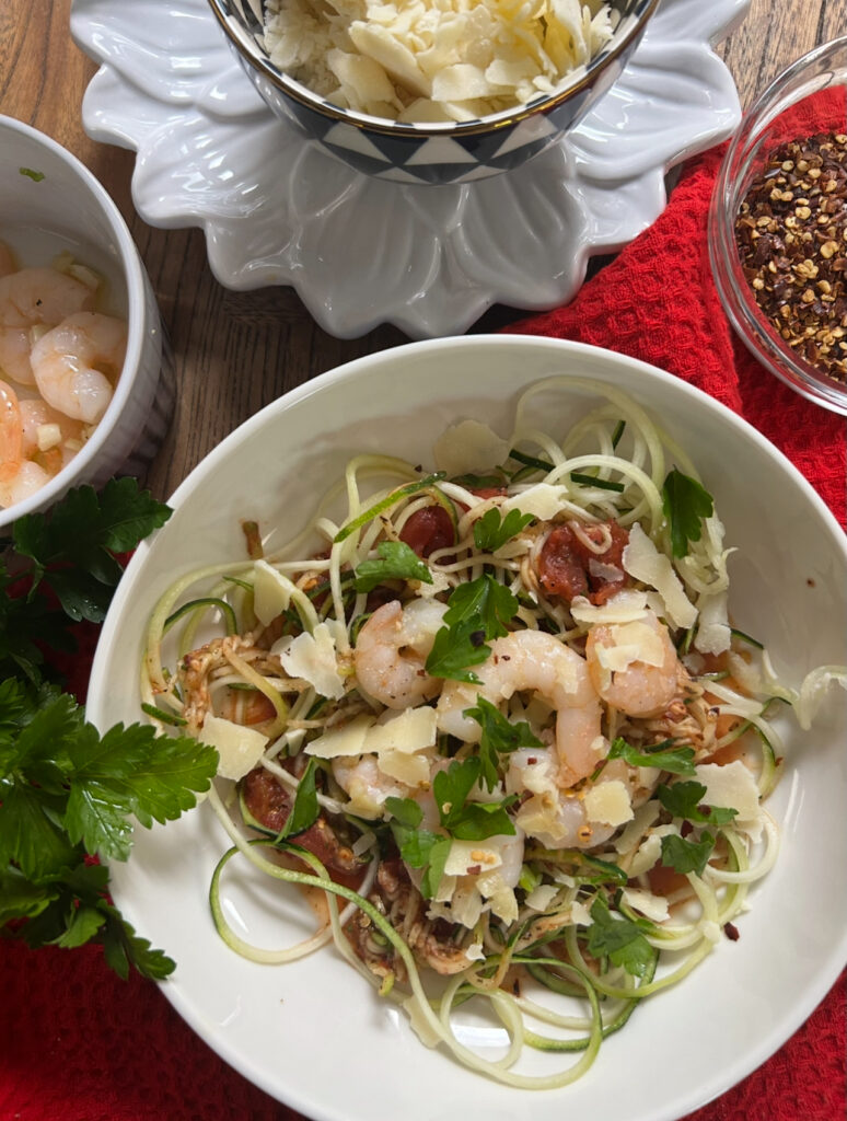 spicy prawns with zucchini noodles and tomatoes